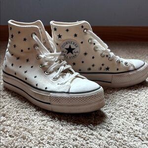 Cream colored star platform converse